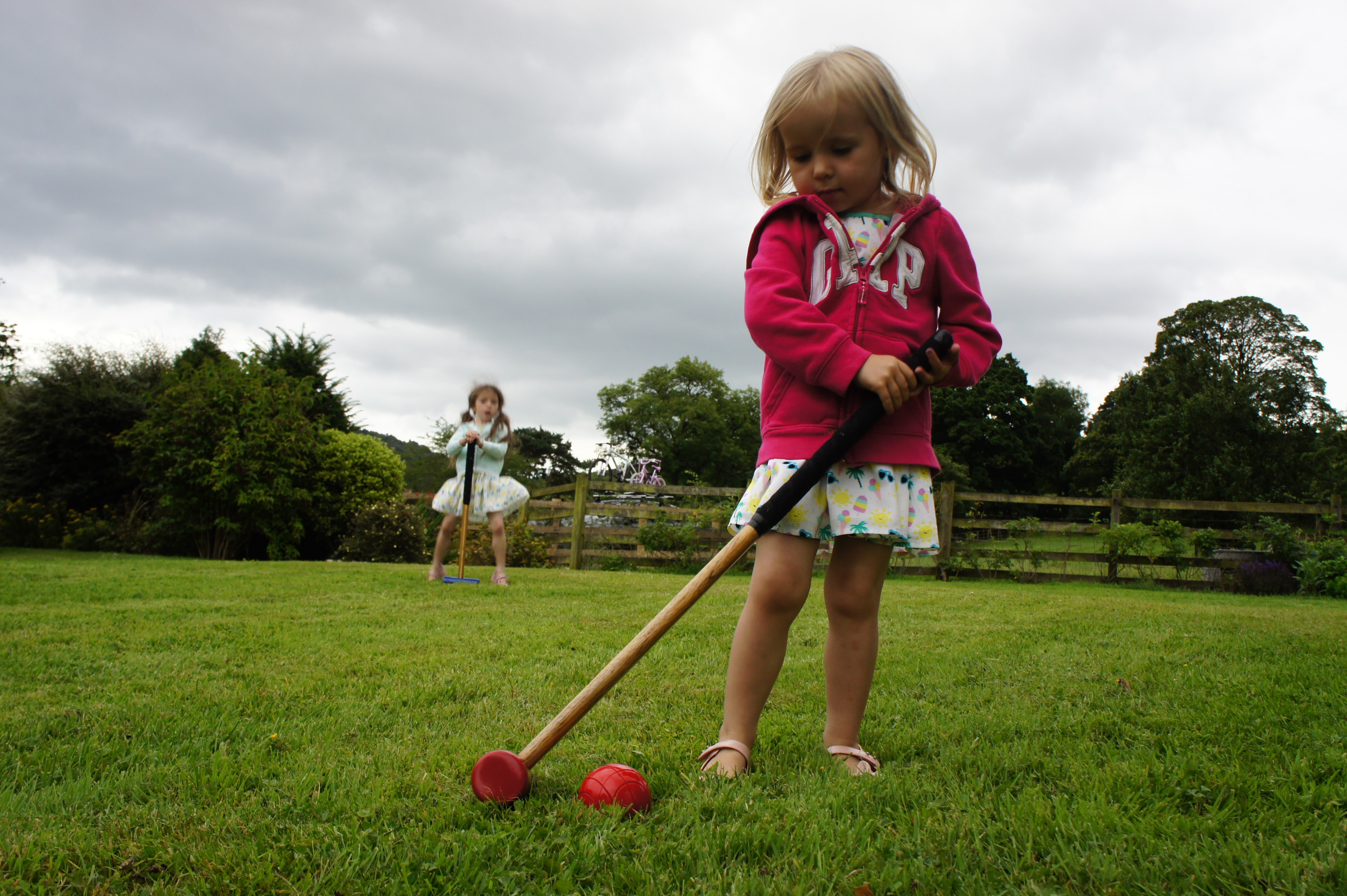 Children playing with the Standford Croquet Set